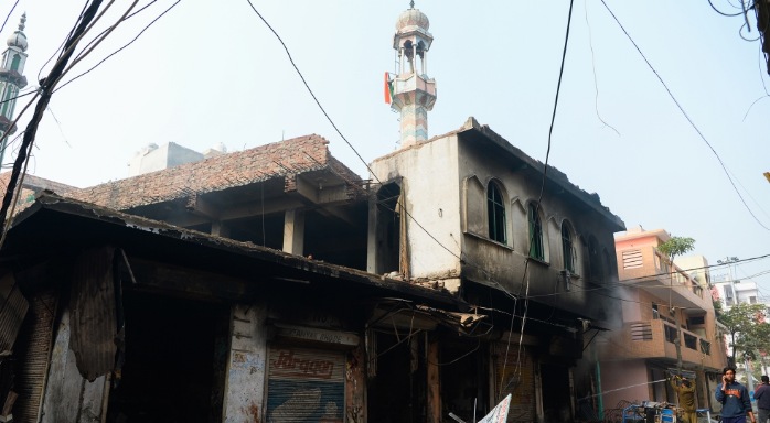 Mosque set on fire during Delhi's worst violence in decades